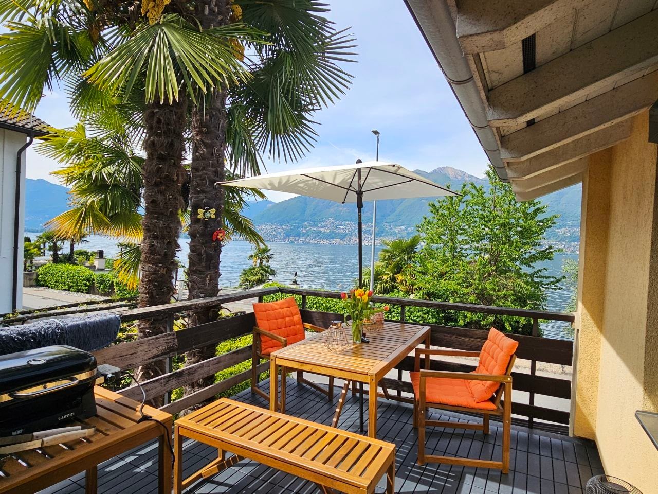 Casa Lupo terrace with lake and mountain view, Ticino
